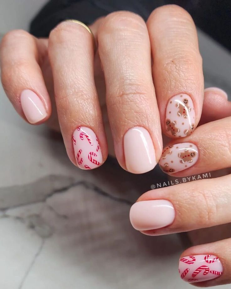 short christmas nails with candy canes and gingerbread men