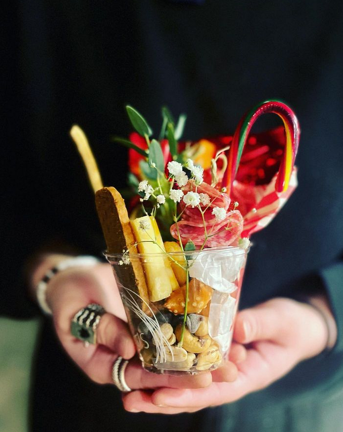 Holiday Charcuterie Cup with candy cane